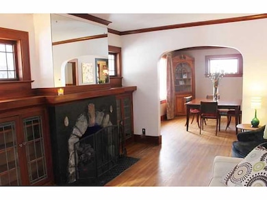 Family Room Gumwood trim, gas fireplace and hardwo