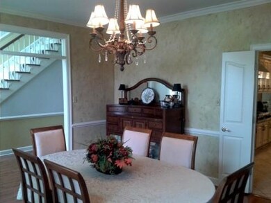 Dining room has hardwood floors and at 15x14 is la
