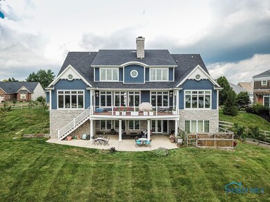 Back of home overlooking meadow and river