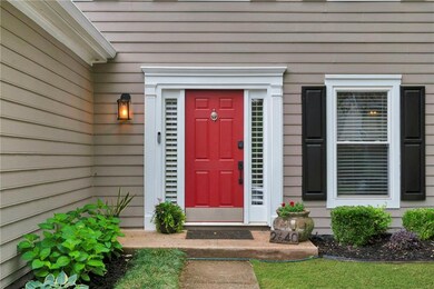 Lovely landscaping and brand new exterior paint ar