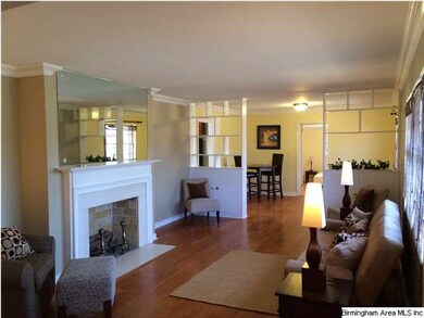 Large living room with fresh paint and wood burnin