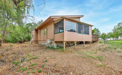 Back of home, enclosed side porch