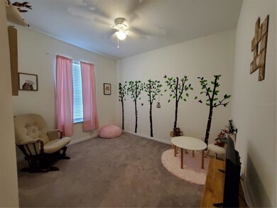 2nd bedroom set up as a nursery/play room. The gra