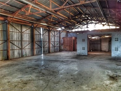 HUGE barn with workshops within it.