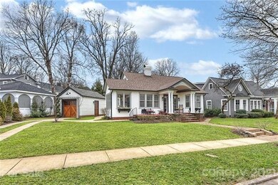 Wide, expansive lot with beautiful garage