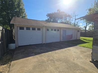 3 car extended garage behind house