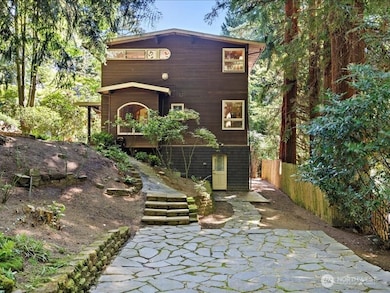 The home sits on close to a 1/2 acre with a park like setting.