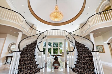 A sweeping stair rotunda in the reception hall is 