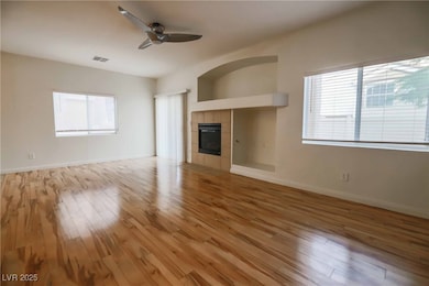 Unfurnished living room featuring light wood finis