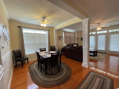 Hardwood Flooring and Columns for that Southern Fl