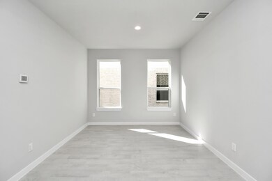 Make memories gathered around the table with your family and friends! This dining spacious room features elegant flooring, custom paint, and adjacent to family room and kitchen for open concept feel. Sample photo of completed home with similar floor plan. Actual colors and selections may vary.
