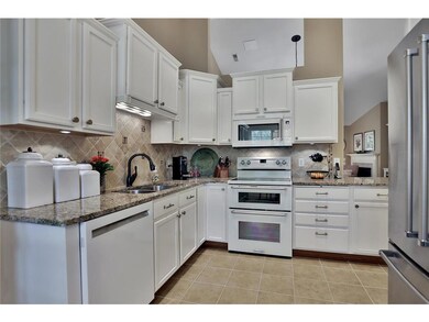 Kitchen w/ vaulted ceiling