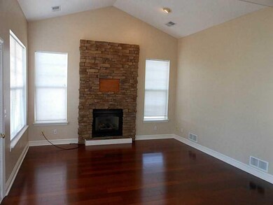 Living Room. Family Room with hardwood floor, ston
