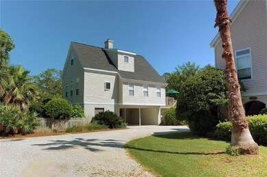 28 Sanctuary Cove is to the left. Two carport park