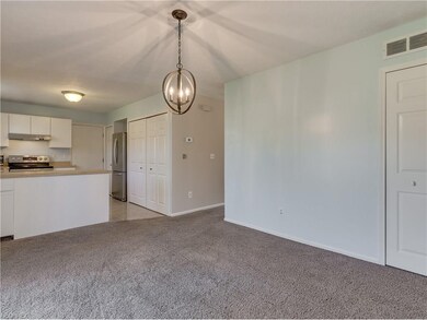 Dining area which opens to the kitchen.