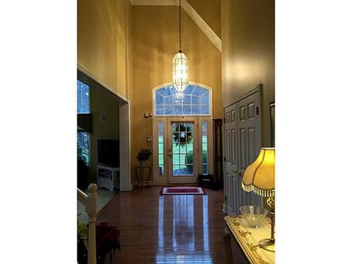 Entry/Foyer. The two-story foyer is open and invit