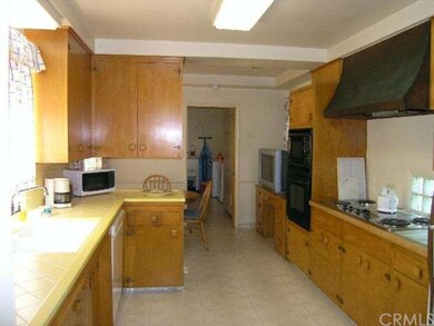 Kitchen is large and well-preserved with breakfast