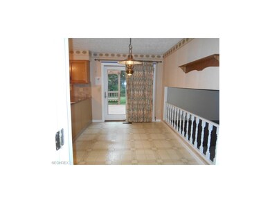 SLIDING DOORS LEAD TO YOUR DECK AND PRIVATE YARD