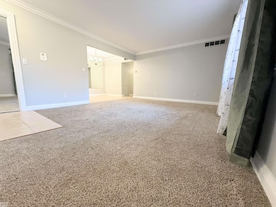 •   The room provides multiple layout options — ideal for sectional seating, media wall, or home-office integration.    •   Open flow into the dining area creates one continuous, functional living space that feels larger than the square footage.