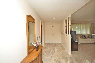 Double door entry, travertine tile