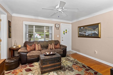 Living room looking into Den/Office/Dining