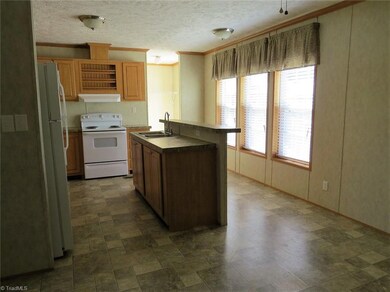 Kitchen with Island and Bar