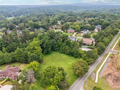Aerial view of residential area with a forest