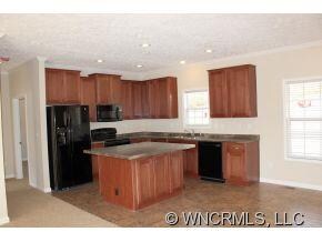 open kitchen w/ breakfast bar