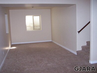 Open downstairs family room and two other bedrooms