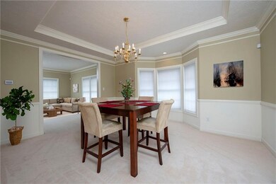 Formal Dining room with trey ceiling, crown moldin