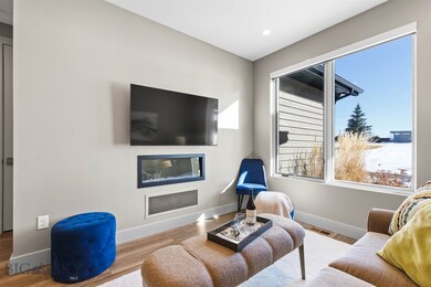 Cozy family room with stylish electric fireplace.