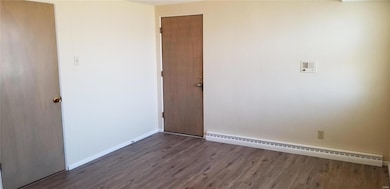 New vinyl in 4th bedroom/office. Door on right comes from hall with single door private front entrance.