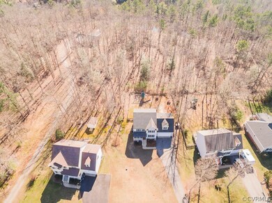 AERIAL VIEW OF HOUSE, DEEP LOT ALLOWS PRIVACY