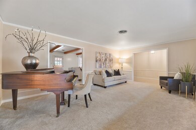 The extra wide entrance from the foyer allows acce