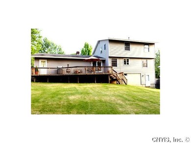 Exterior Back Complete fecnced in yard