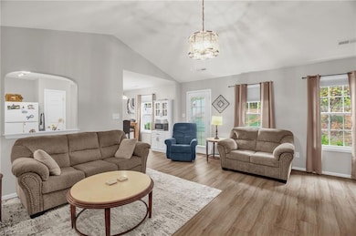 Abundant natural light soaking living area and kitchen / dining area.