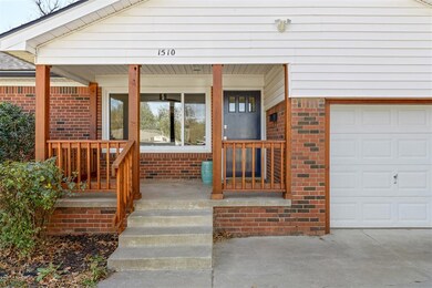 Property entrance featuring a garage