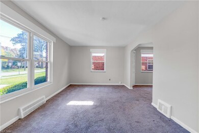 Unfurnished room with plenty of natural light and 