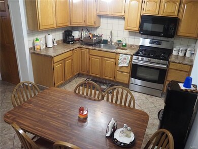 Kitchen with eat in dining area.
