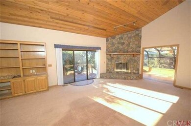 Great room features a wet bar, built in entertainm