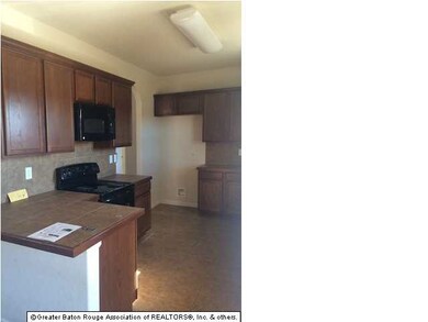 Kitchen with lots of counter space and cabinet spa