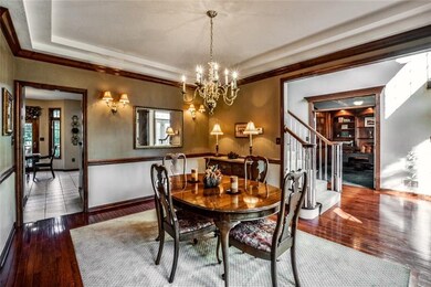 Formal dining room enhanced with crown molding, ch