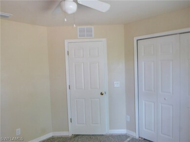 Middle Bedroom view toward closet and door