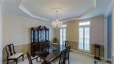 Large Formal Dining room off the kitchen, plantati