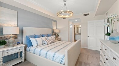 Bedroom featuring a chandelier, light colored carp