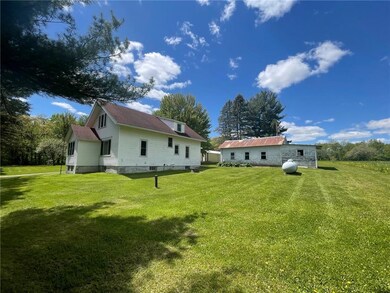 This property includes 10.72 acres including a mix of field and woods!