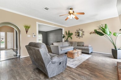 Another view of the living room open to the flex space