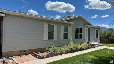 View of front of property with a front yard
