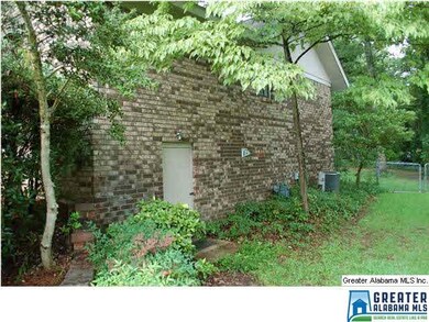 Walk-out crawl space with room for workshop.