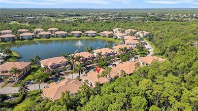 Aerial overview of property's location with a nearby body of water and nearby suburban area
